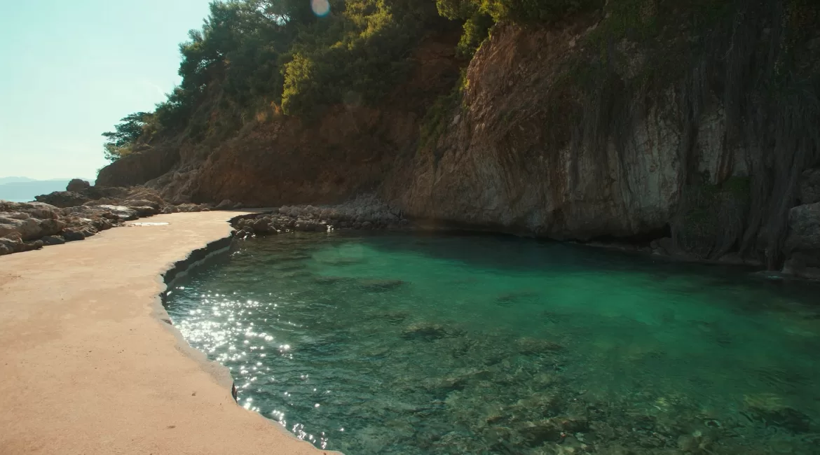 Swimming near Taormina in late summer: a quiet cove with clear warm water